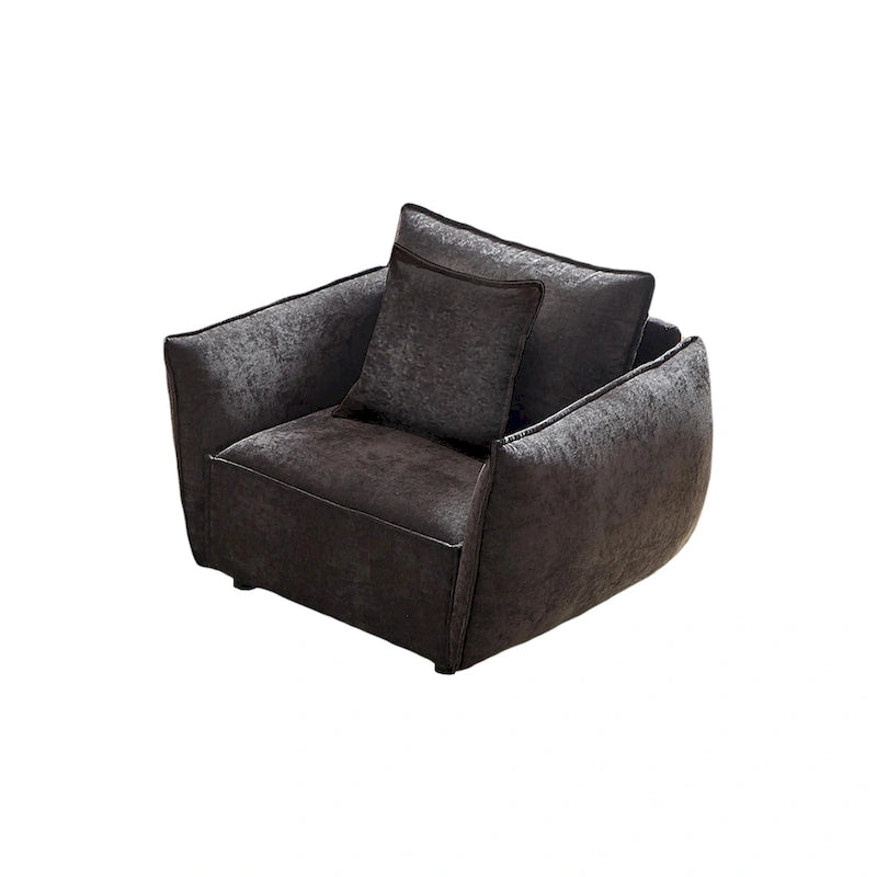 Black Upholstered Arm Chair with Pillows and Wide Cushion